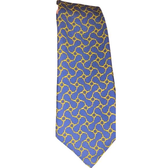 Hermes silk tie featuring a blue background and a yellow chain-link
